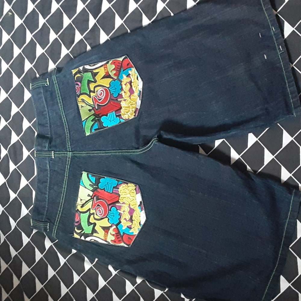 * RISK BLUE WITH COLORFUL POCKETS,  PROMINENT GREEN STITCHING,  SIZE 34